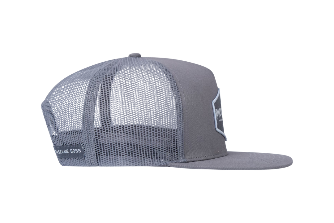 Picklenation MCMLXV grey trucker hat side profile displaying premium structured front and sophisticated pickleball styling