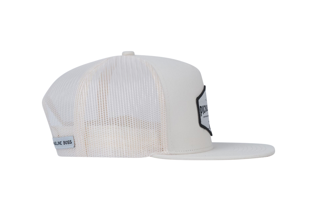Picklenation MCMLXV white trucker hat side profile showing structured front panel and classic pickleball trucker design